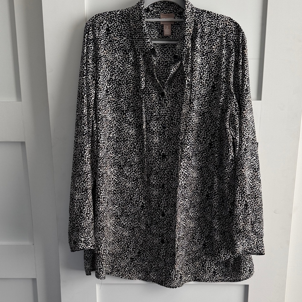 Chico's Monochrome super cute Animal Print Blouse. Machine washable.